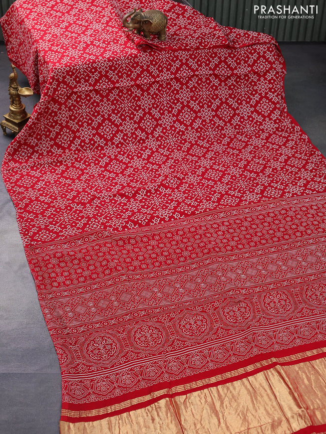 Modal silk saree red with allover ikat prints and ajrakh printed pallu