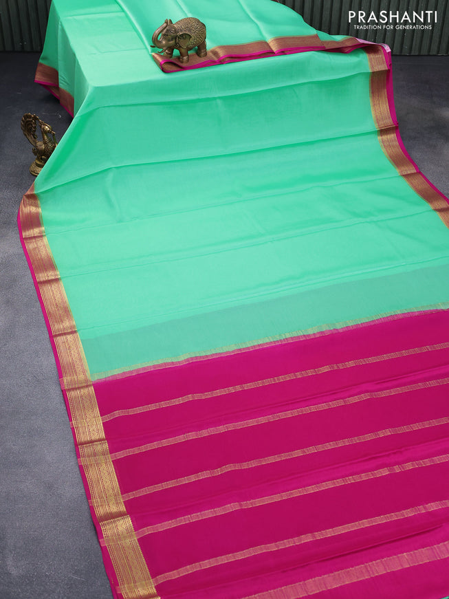 Mysore silk saree teal green and pink with plain body and zari woven border