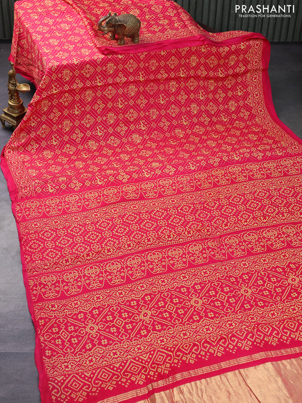 Modal silk saree pink with allover patola prints and zari woven pallu