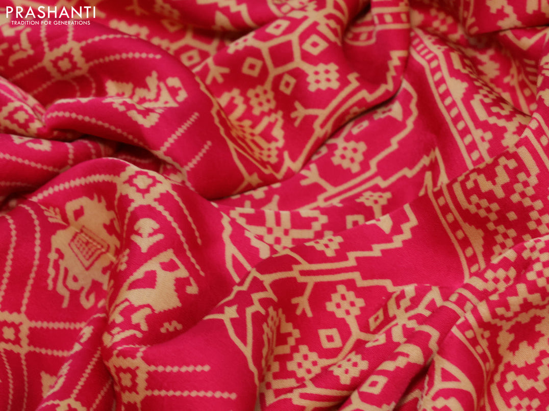 Modal silk saree pink with allover patola prints and zari woven pallu