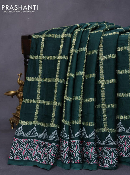 Modal silk saree dark green with allover zari checked pattern and printed border