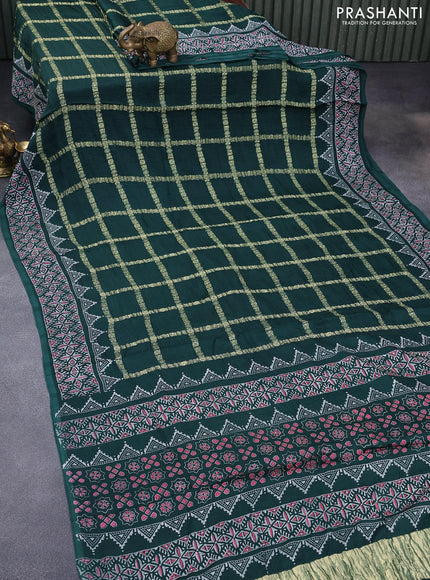 Modal silk saree dark green with allover zari checked pattern and printed border