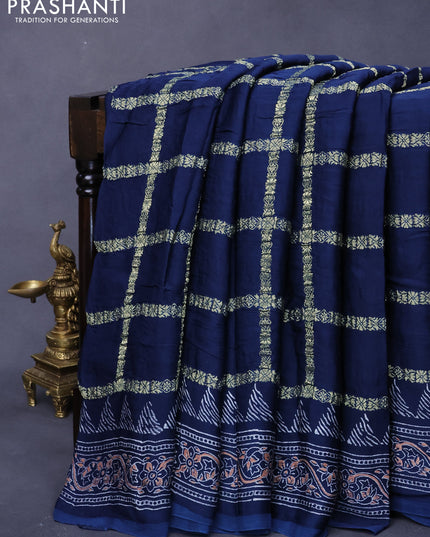 Modal silk saree peacock blue with allover zari checked pattern and printed border