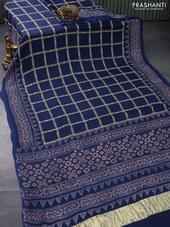 Modal silk saree peacock blue with allover zari checked pattern and printed border