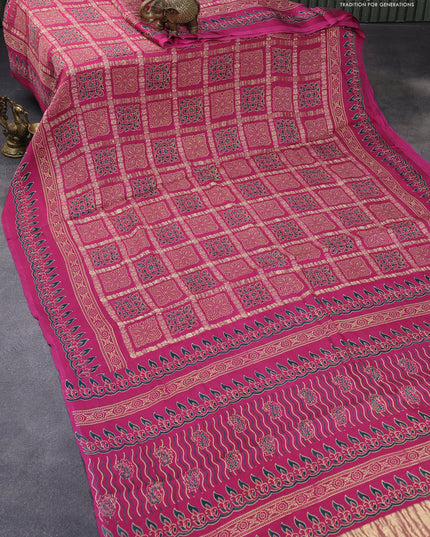 Modal silk saree pink with allover zari checks & ajrakh butta prints and zari woven pallu