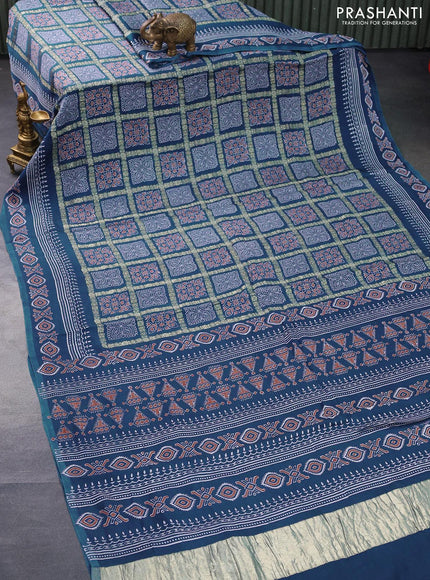 Modal silk saree peacock blue with allover zari checks & ajrakh butta prints and zari woven pallu