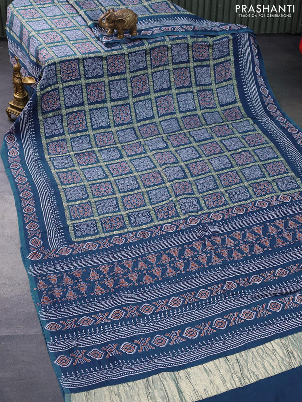 Modal silk saree peacock blue with allover zari checks & ajrakh butta prints and zari woven pallu