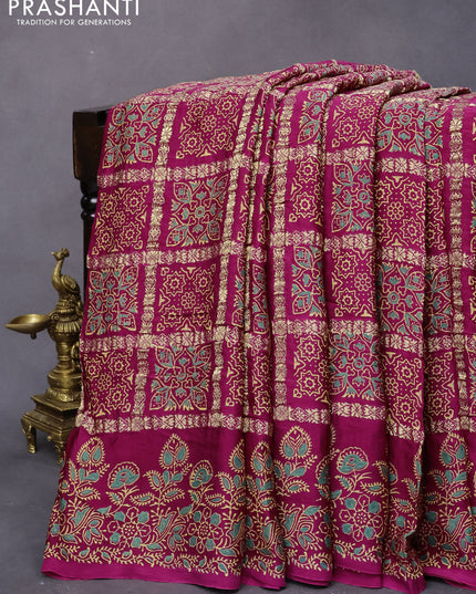 Modal silk saree magenta pink with allover zari checks & ajrakh butta prints and zari woven pallu