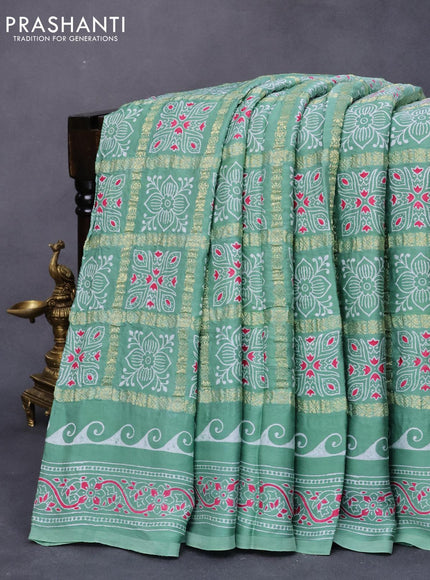 Modal silk saree pastel green with allover zari checks & ajrakh butta prints and zari woven pallu