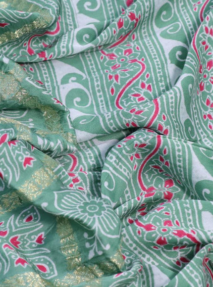 Modal silk saree pastel green with allover zari checks & ajrakh butta prints and zari woven pallu