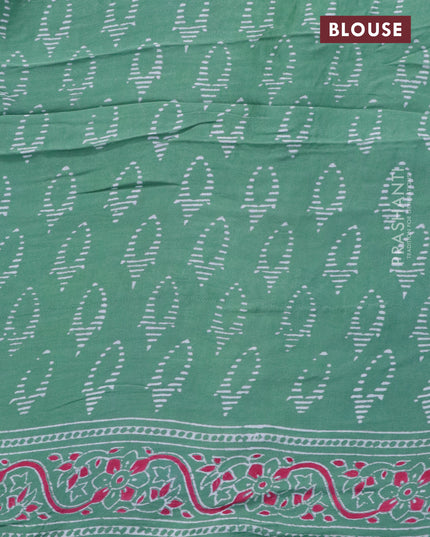 Modal silk saree pastel green with allover zari checks & ajrakh butta prints and zari woven pallu
