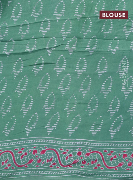 Modal silk saree pastel green with allover zari checks & ajrakh butta prints and zari woven pallu