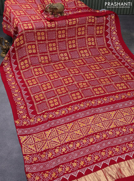 Modal silk saree red with allover zari checks & ajrakh butta prints and zari woven pallu