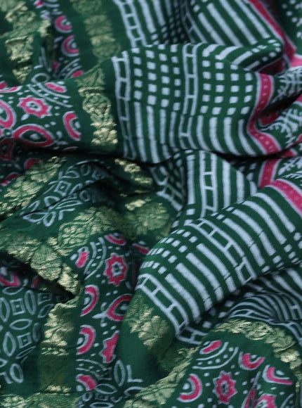 Modal silk saree green with allover zari checks & ajrakh butta prints and zari woven pallu