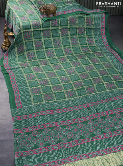 Modal silk saree green shade with allover zari checks & ajrakh butta prints and zari woven pallu