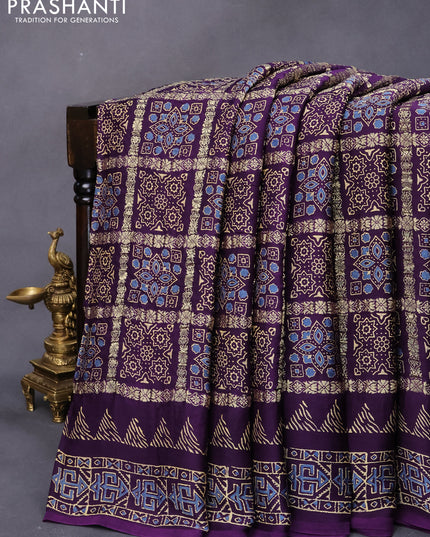 Modal silk saree violet with allover zari checks & ajrakh butta prints and zari woven pallu