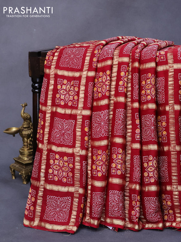 Modal silk saree maroon with allover zari checks & ajrakh butta prints and zari woven pallu