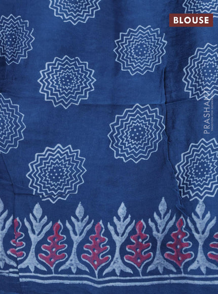 Modal silk saree blue shade with allover zari checks & ajrakh butta prints and zari woven pallu