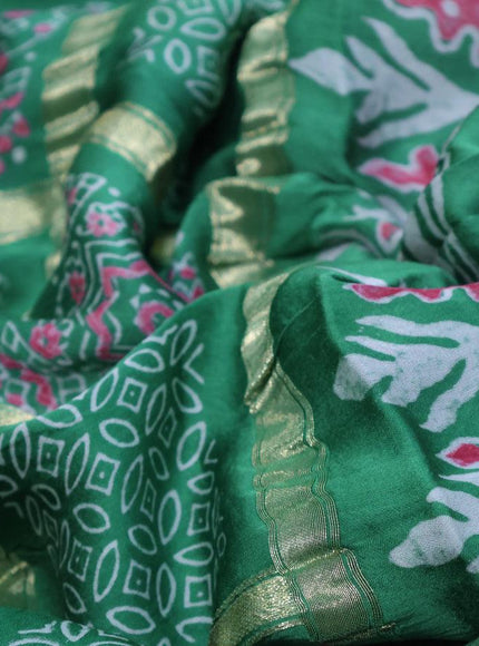 Modal silk saree green shade with allover zari checks & ajrakh butta prints and zari woven pallu