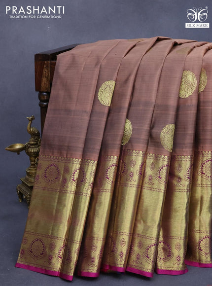 Pure kanjivaram silk saree pastel brown and purple with peacock zari woven buttas and long rich zari woven border