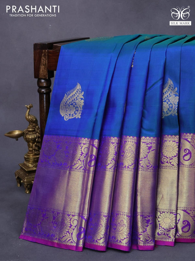 Pure kanjivaram silk saree dual shade of bluish green and dual shade of purple with zari woven buttas and long rich zari woven border