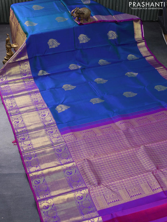 Pure kanjivaram silk saree dual shade of bluish green and dual shade of purple with zari woven buttas and long rich zari woven border