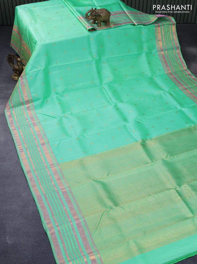 Pure kanjivaram silk saree teal green with allover zari woven buttas and zari woven border