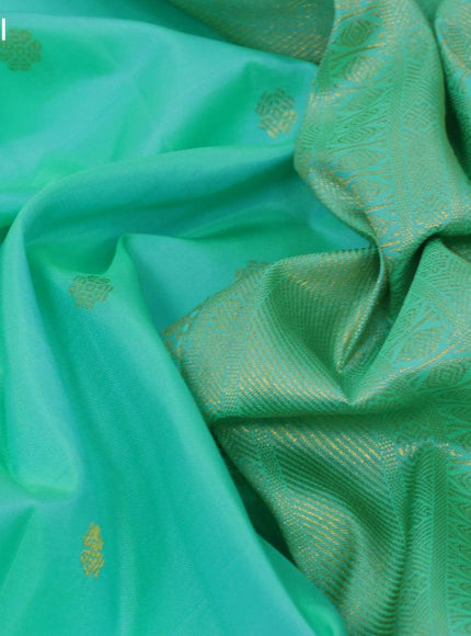 Pure kanjivaram silk saree teal green with allover zari woven buttas and zari woven border