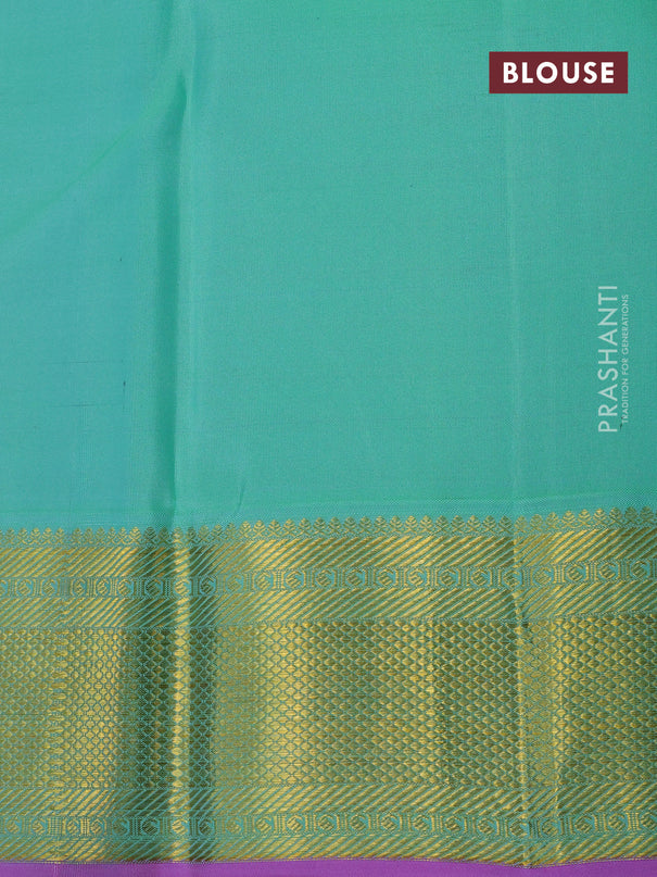 Pure kanjivaram silk saree teal green shade and pink with annam zari woven buttas and zari woven border