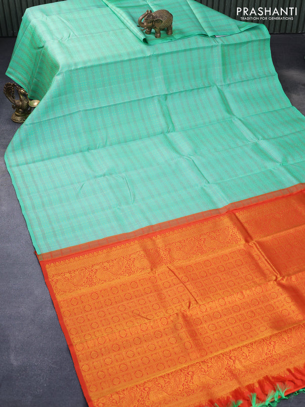 Pure kanjivaram silk saree teal green and orange with allover zari checks & butta weaves in borderless style