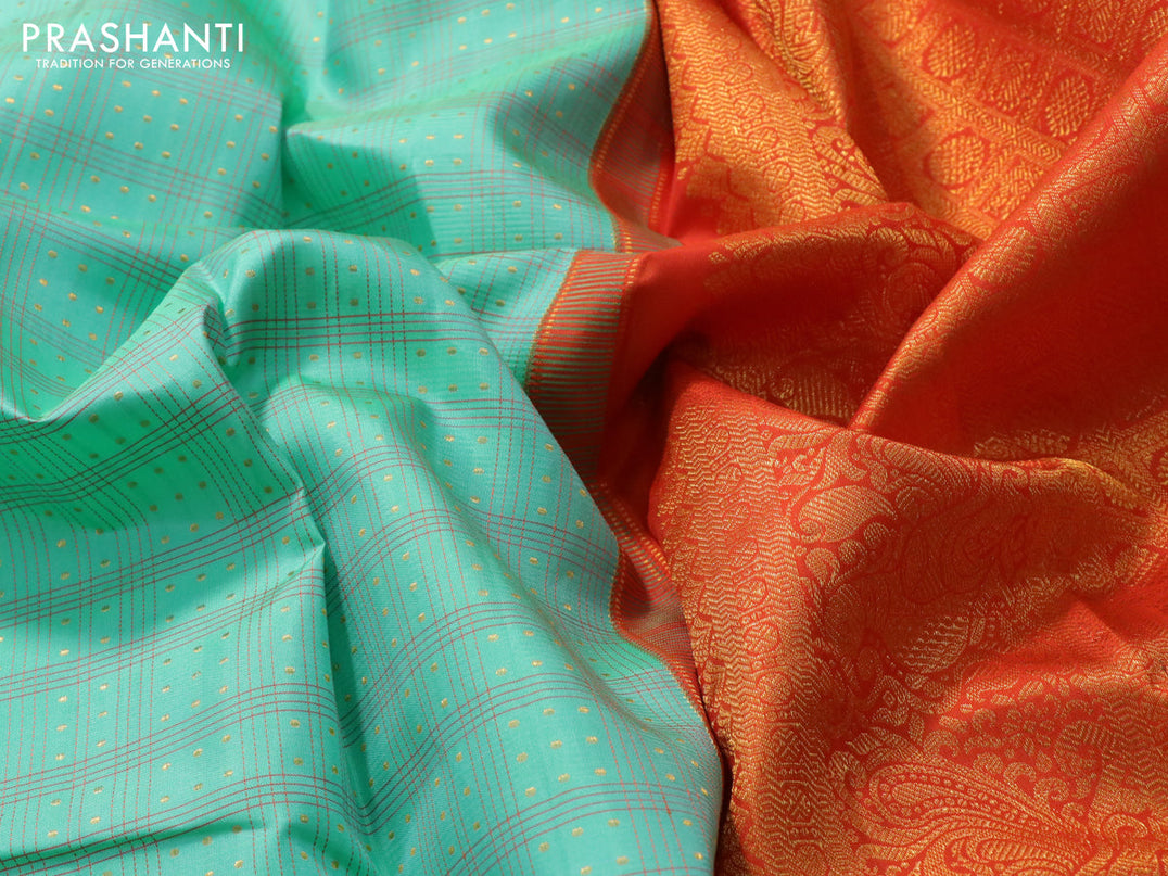 Pure kanjivaram silk saree teal green and orange with allover zari checks & butta weaves in borderless style