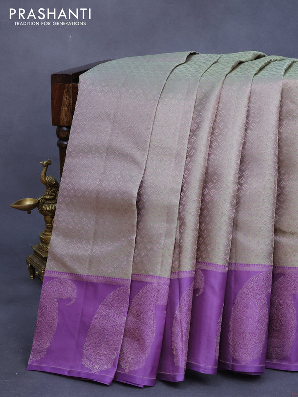 Pure kanjivaram silk saree pastel green and violet with allover silver zari woven butta weaves and zari woven butta border