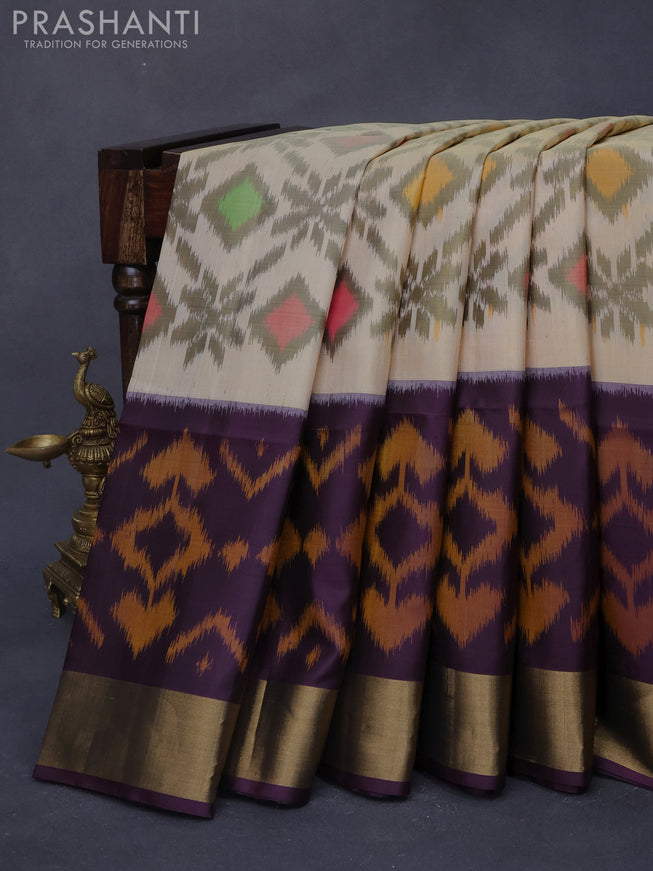 Ikat soft silk saree sandal and deep wine shade with allover ikat weaves and long ikat woven zari border