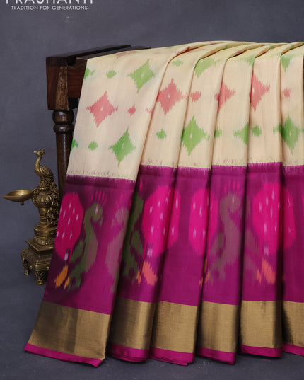 Ikat soft silk saree cream and magenta pink with allover ikat weaves and long ikat woven zari border