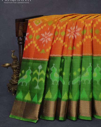 Ikat soft silk saree orange and light green with allover ikat weaves and long ikat woven zari border