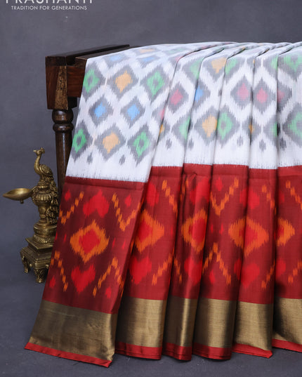 Ikat soft silk saree off white grey and maroon with allover ikat butta weaves and long ikat woven zari border