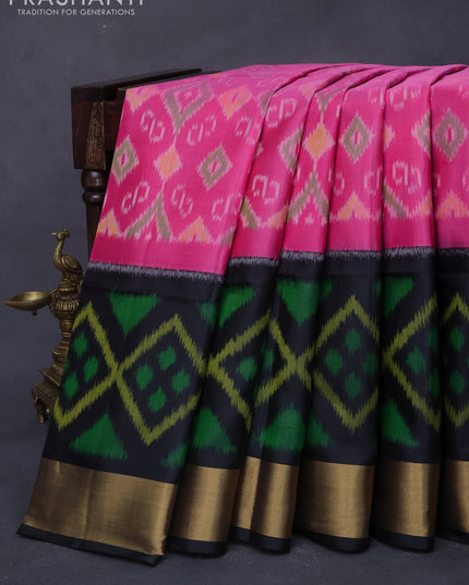 Ikat soft silk saree pink and black with allover ikat weaves and long ikat woven zari border