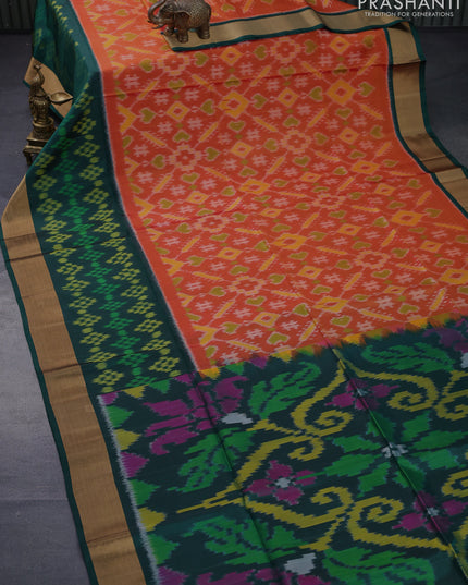 Ikat soft silk saree orange and dark green with allover ikat weaves and long ikat woven zari border