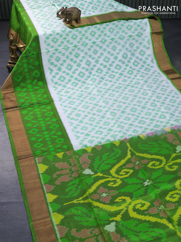 Ikat soft silk saree off white and green with allover ikat weaves and long ikat woven zari border