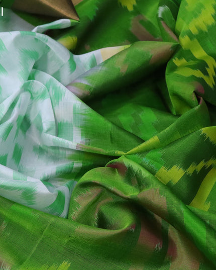 Ikat soft silk saree off white and green with allover ikat weaves and long ikat woven zari border
