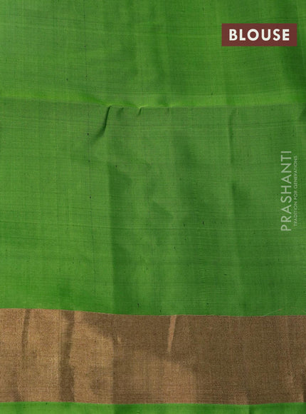 Ikat soft silk saree off white and green with allover ikat weaves and long ikat woven zari border