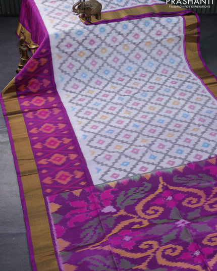 Ikat soft silk saree off white and purple with allover ikat weaves and long ikat woven zari border