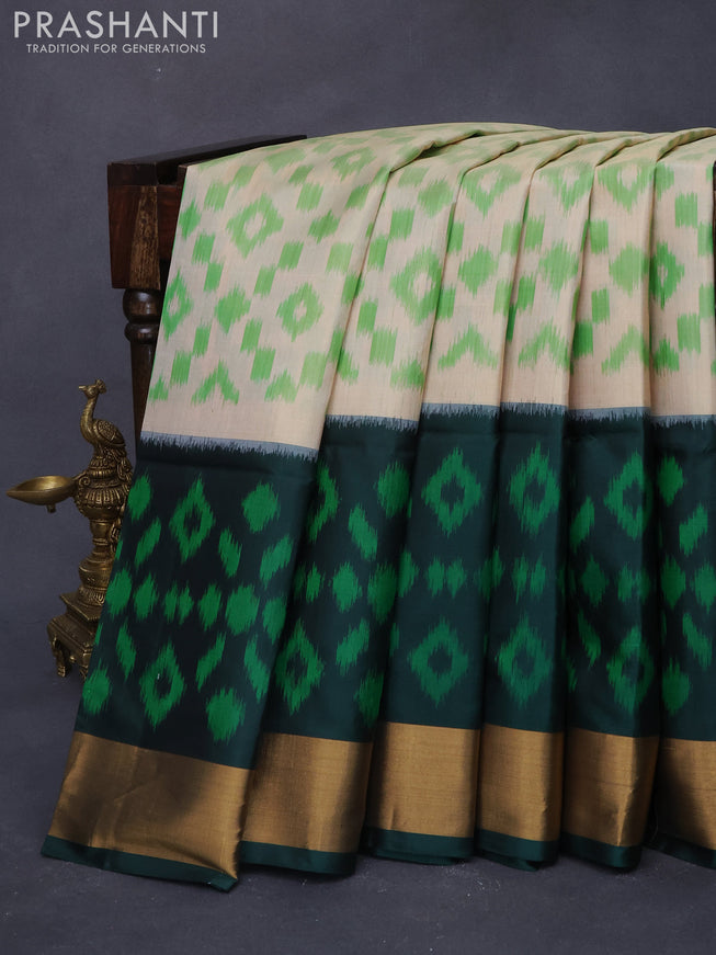 Ikat soft silk saree cream and dark green with allover ikat weaves and long ikat woven zari border
