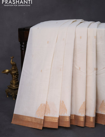 Kanchi cotton saree off white and sandal with zari woven buttas and zari woven simple border