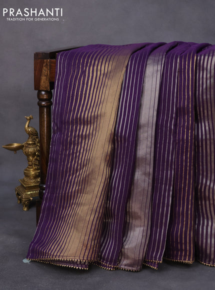 Organza silk saree deep violet with allover zari stripes pattern and gottapatti lace work border & embroidered readymade blouse