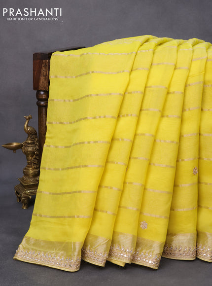 Organza silk saree lime yellow with allover zari weaves and embroidery work border & kalamkari prints embroidered readymade blouse