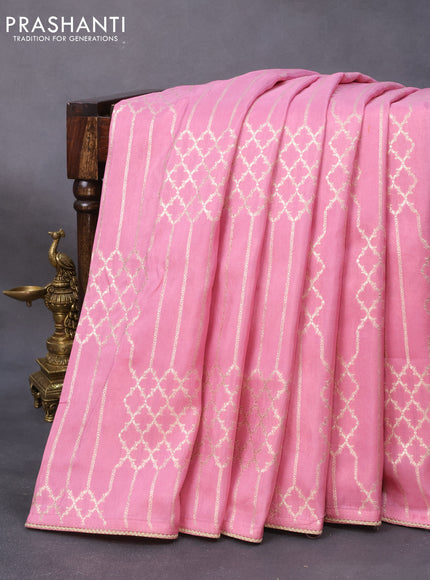 Banarasi munga tussar saree light pink with allover zari woven geometric weaves and lace work border & embroidered readymade blouse