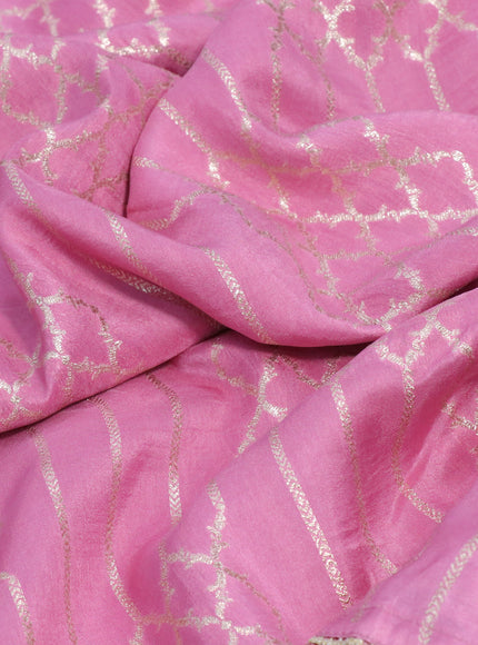 Banarasi munga tussar saree light pink with allover zari woven geometric weaves and lace work border & embroidered readymade blouse