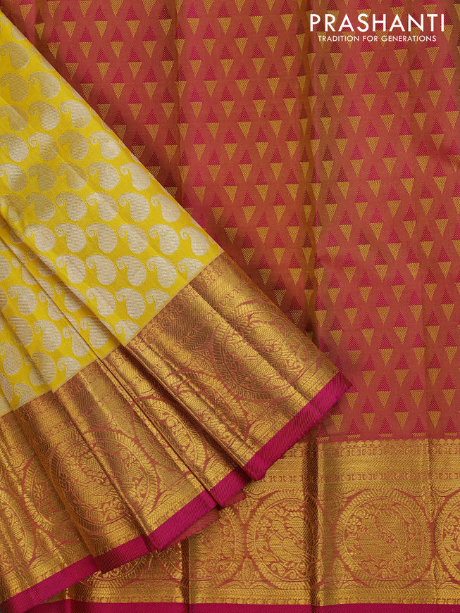 Pure silk kids lehenga yellow and pink with allover silver zari woven paisley buttas and annam zari woven border