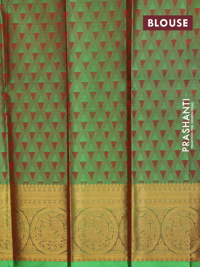 Pure silk kids lehenga orange and green with silver zari buttas & self emboss and annam zari woven border